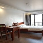 Cheap bright studio apartment with balcony in Lac Long Quan street, Tay Ho district for rent