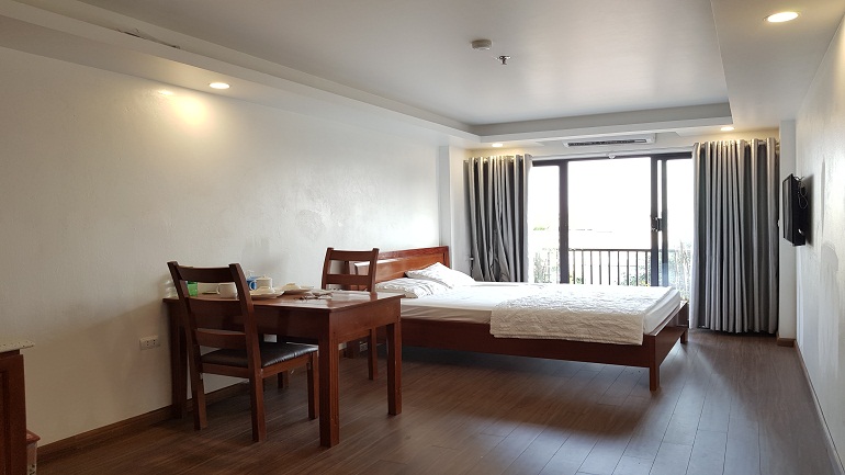 Cheap bright studio apartment with balcony in Lac Long Quan street, Tay Ho district for rent